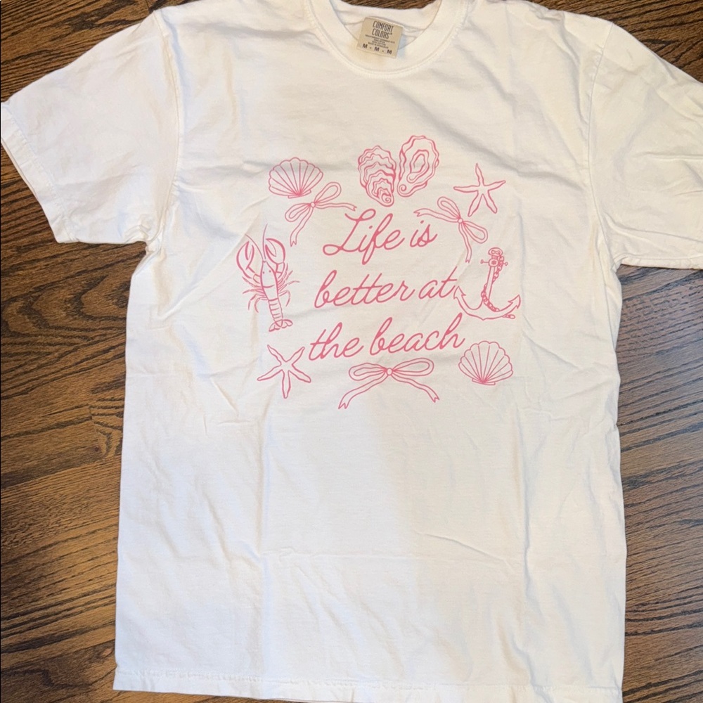 White T-Shirt with Pink Beach Graphic